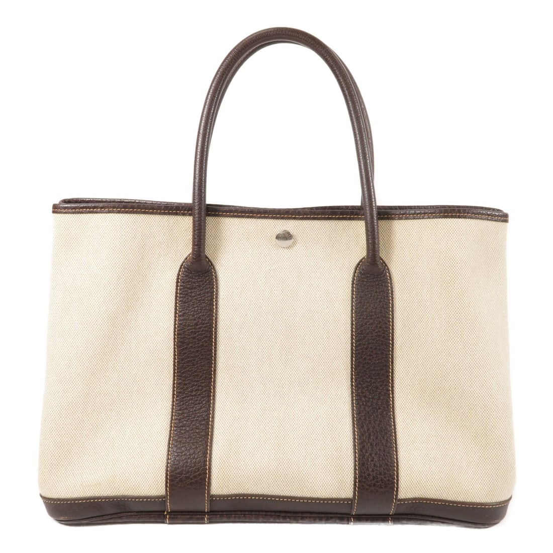 Hermes GardenParty PM Beige Canvas Tote with Palladium Hardware: Hermes GardenParty PM Beige Canvas Tote with Palladium Hardware This Hermes Garden Party PM tote bag features a beige canvas exterior and is designed for women. It offers a spacious interior, making i