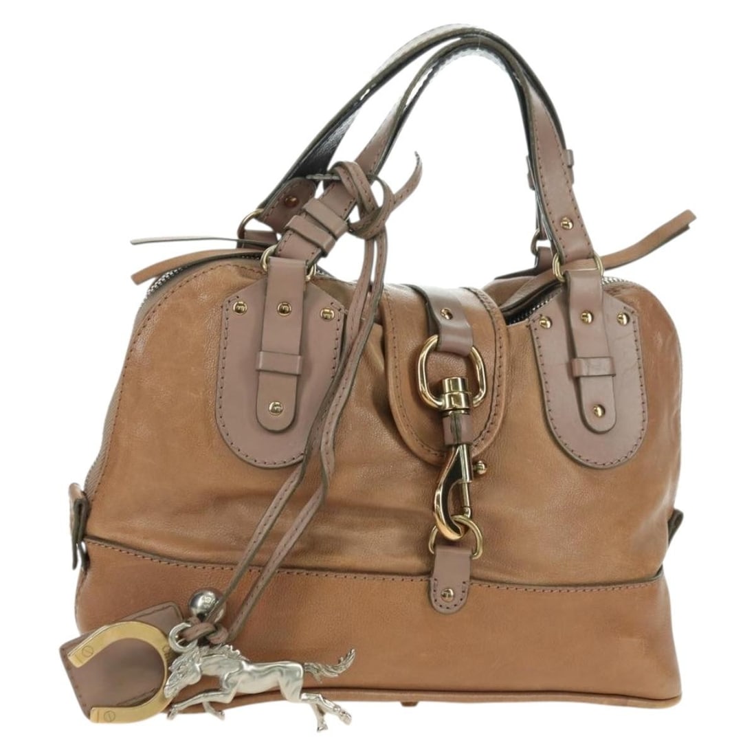 Chloe Kerala leather brown gold handbag with dust bag and charm: Chloe Kerala leather brown gold handbag with dust bag and charm This Chloe Kerala handbag is crafted from brown and gold leather, offering a stylish and functional accessory for women. Made in Romania