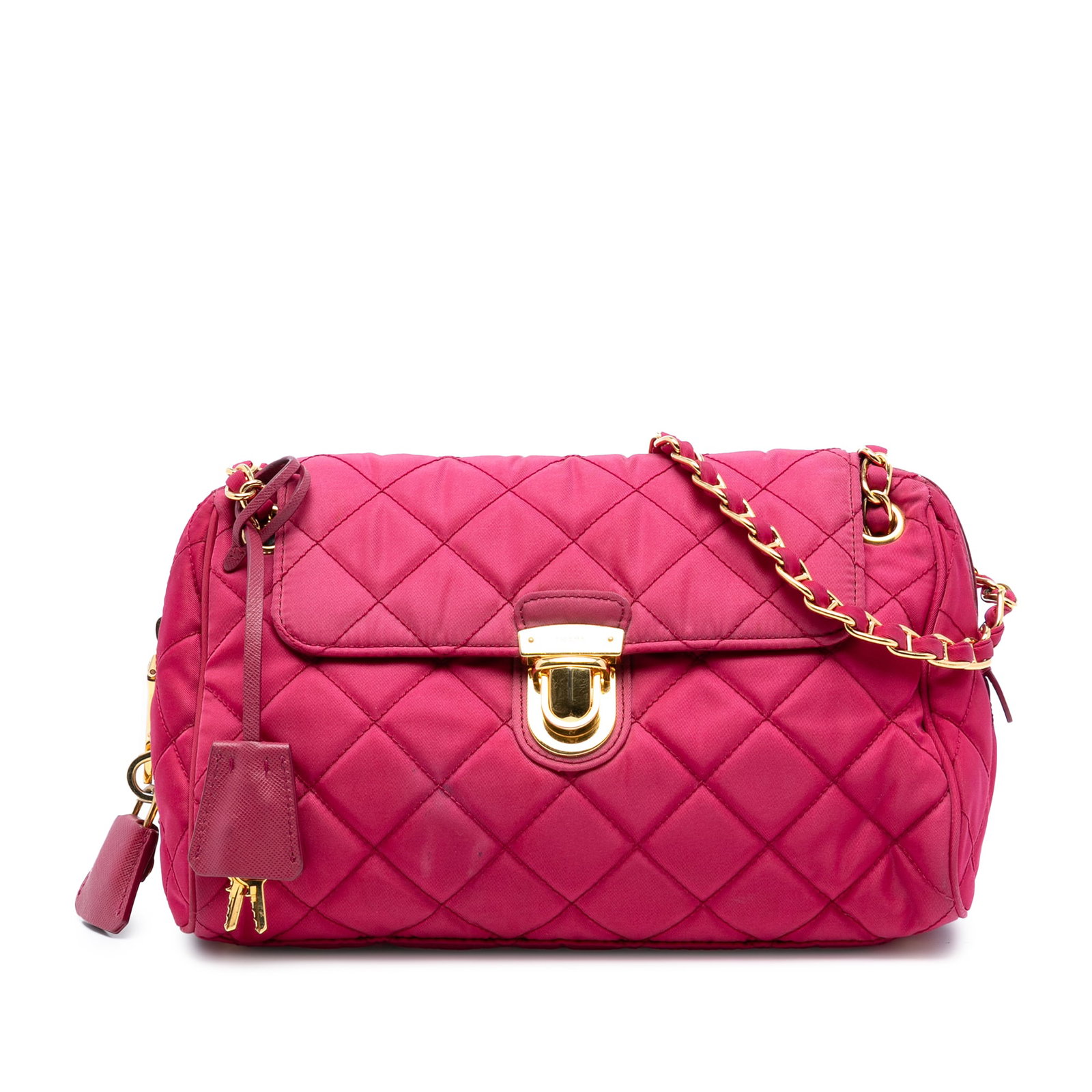 Prada Impuntu Tessuto Quilted Pink Crossbody Bag with Chain Strap: Prada Impuntu Tessuto Quilted Pink Crossbody Bag with Chain Strap This Prada Impuntu Tessuto Chain Crossbody features a quilted nylon body in pink, complemented by a woven nylon chain strap. The bag i