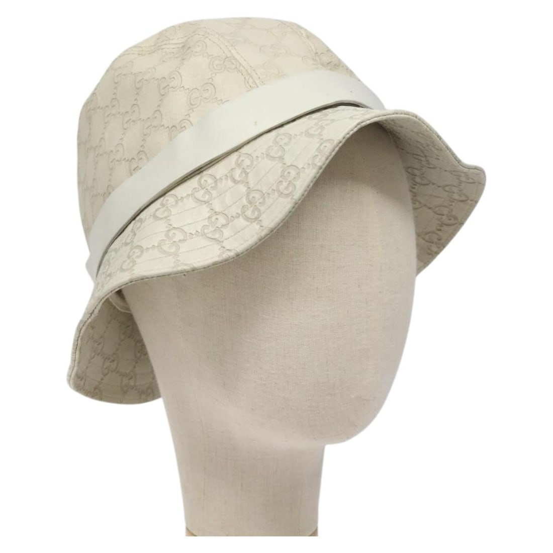 White GG Canvas Guccissima Medium Hat by Gucci for Women: White GG Canvas Guccissima Medium Hat by Gucci for Women This is a women's GUCCI hat crafted from signature GG Canvas in white. The hat is size M, with a head circumference of approximately 58 cm (22.