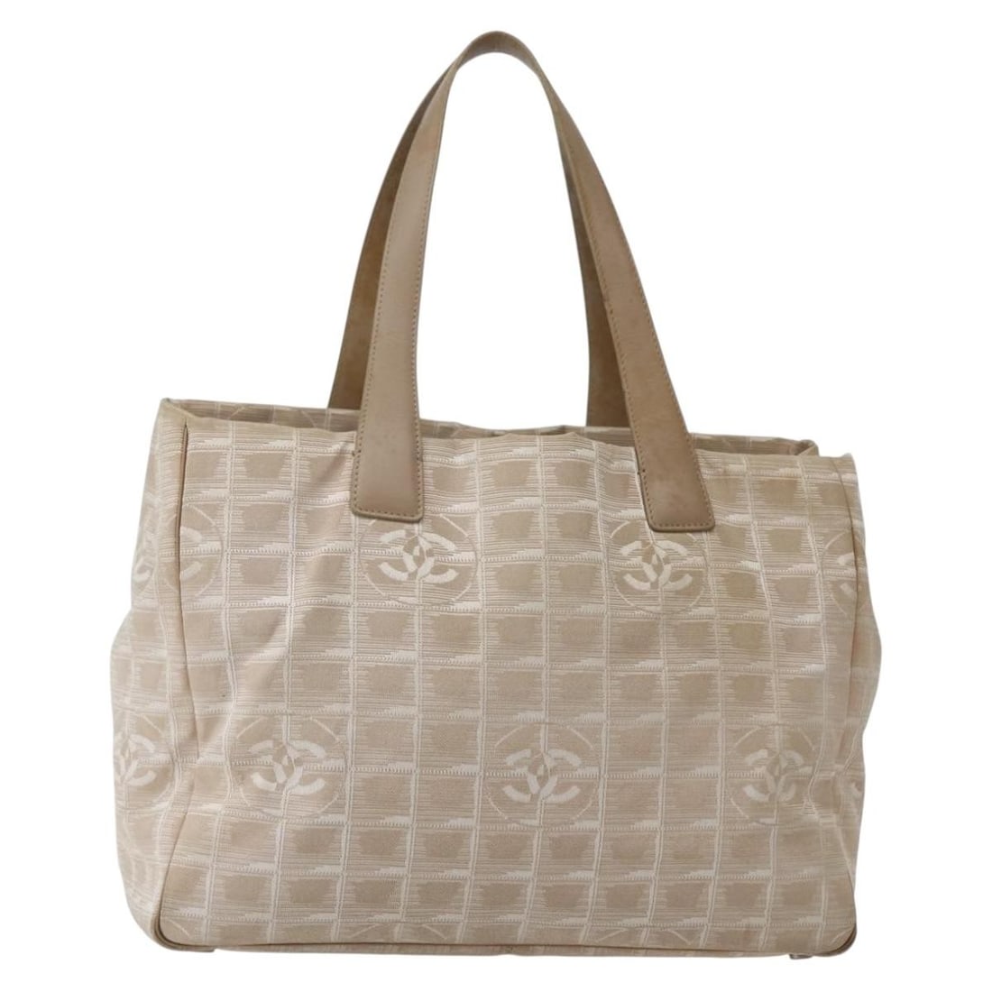 Chanel New Travel Line Nylon Beige Gold Tote Bag: Chanel New Travel Line Nylon Beige Gold Tote Bag This CHANEL Travel Line tote bag is crafted from beige and gold nylon and features the signature CC logo. Designed for women, the bag is made in Italy 