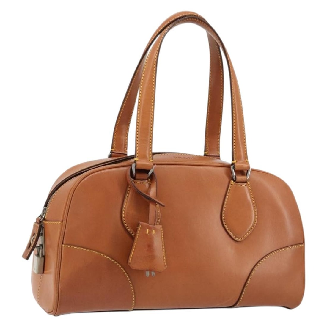 Prada beige silver leather shoulder bag with padlock and key: Prada beige silver leather shoulder bag with padlock and key This PRADA shoulder bag features a beige and silver leather exterior and is designed for women. Made in Italy, the bag offers a stylish and