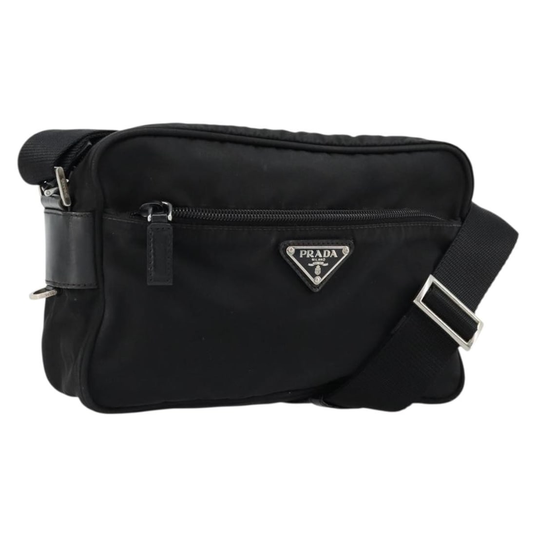 Prada Nylon Black Silver Shoulder Bag with Guarantee Card: Prada Nylon Black Silver Shoulder Bag with Guarantee Card This PRADA shoulder bag is crafted from durable black nylon with silver-tone accents. Designed for women, it features an adjustable shoulder s