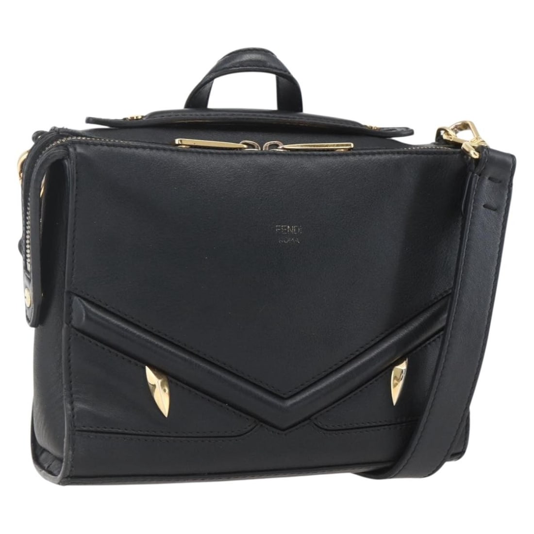 Black Leather Fendi Monster Bugs Eye 2way Handbag with Gold Accents: Black Leather Fendi Monster Bugs Eye 2way Handbag with Gold Accents This FENDI Monster Bugs Eye handbag is crafted from black and gold leather and features a two-way design for versatile carrying. The