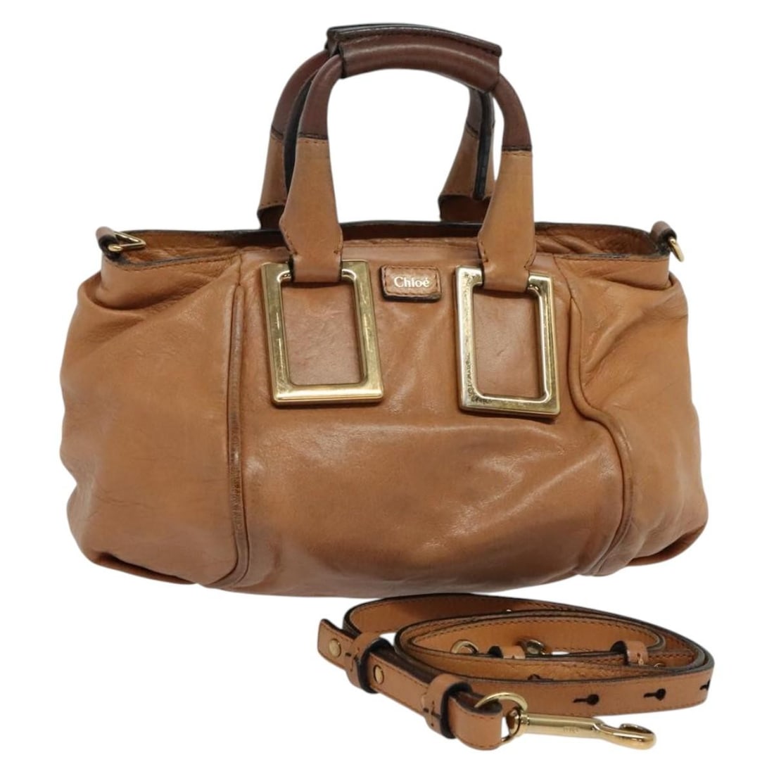 Chloe Brown Leather Two Way Handbag with Gold Accents: Chloe Brown Leather Two Way Handbag with Gold Accents This Chloe 2-way handbag features a brown and gold leather exterior and can be carried by hand or worn with the included shoulder strap. Designed 