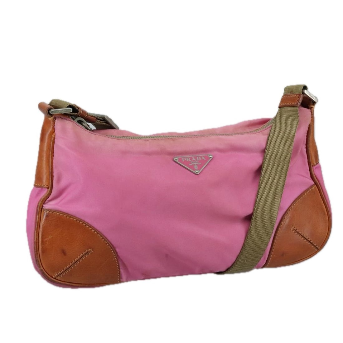 Prada nylon pink beige silver shoulder bag Italy: Prada nylon pink beige silver shoulder bag Italy This PRADA shoulder bag features a stylish combination of pink, beige, and silver nylon. Designed for women, it offers a practical size with an adjusta