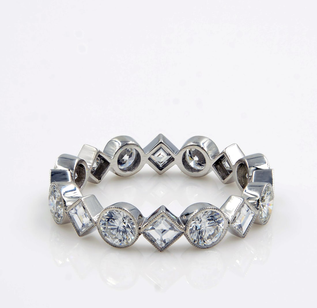 Rachel Koen Platinum Eternity Band 1.98cts Carre Round Cut Diamonds Size 6.25: Rachel Koen Platinum Eternity Band 1.98cts Carre Round Cut Diamonds Size 6.25 This exquisite eternity band features just under 2.00 carats of shimmering carre cut and round diamonds, elegantly set in 