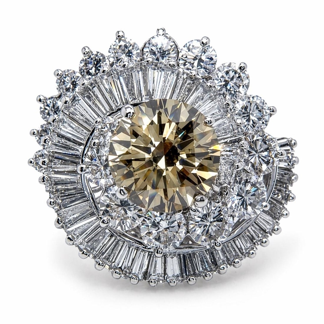 Platinum Ring with GIA 2.46 Ct Fancy Brown-Yellow Diamond and Baguettes: Platinum Ring with GIA 2.46 Ct Fancy Brown-Yellow Diamond and Baguettes This 1960s platinum ring features a GIA certified 2.46 carat natural fancy brown-yellow diamond with VS2 clarity, measuring appr