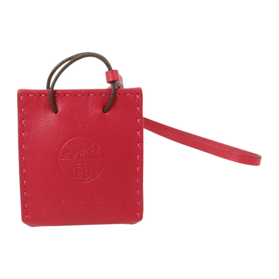 Milo Lambskin Pink Rose Mexico Bag Charm by Hermes: Milo Lambskin Pink Rose Mexico Bag Charm by Hermes This HERMES Sac Orange bag charm is crafted from Milo lambskin leather in a pink hue. Designed for women, it adds a stylish accent to your bag. Made 