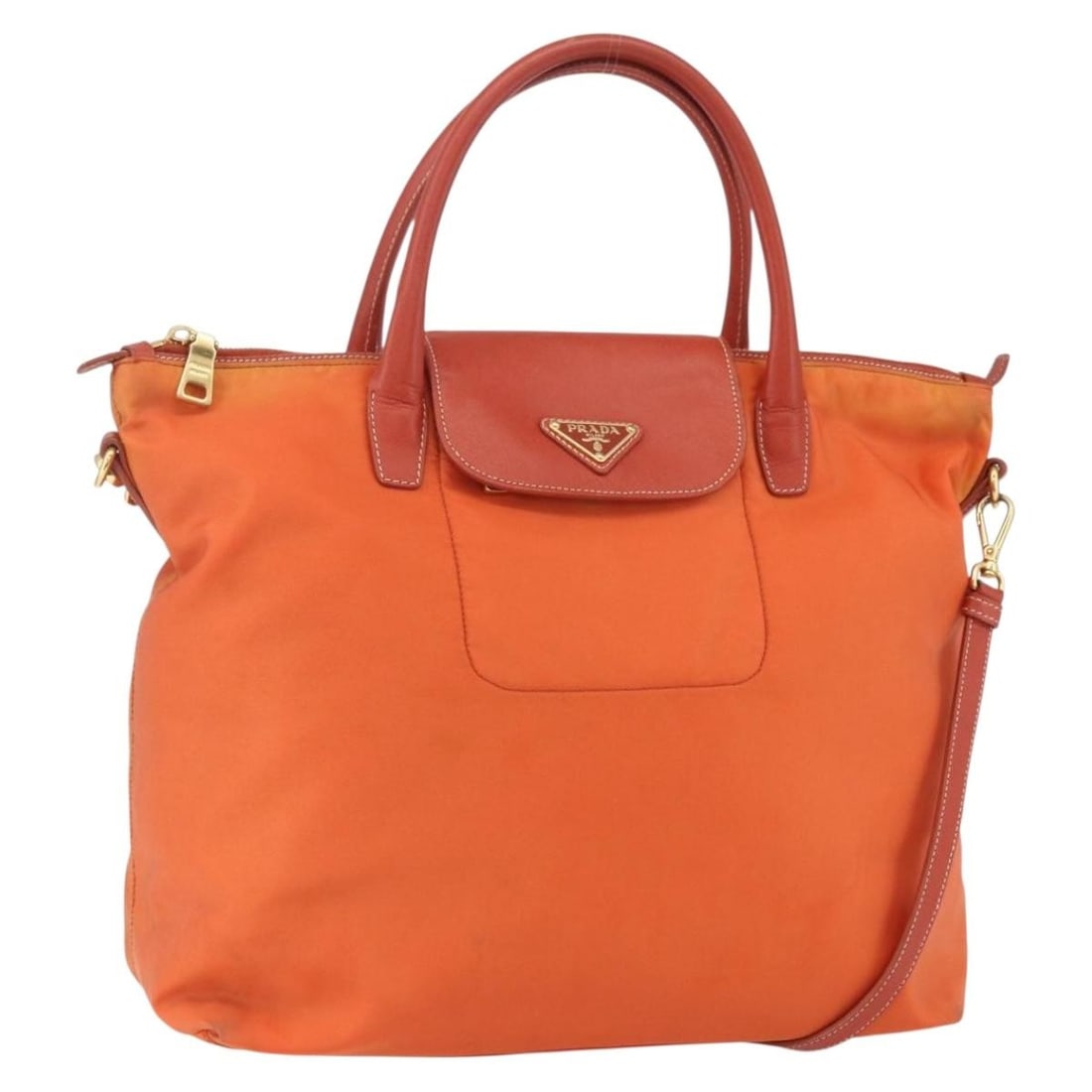 Orange Nylon and Leather PRADA 2way Shoulder Handbag with Gold Accents: Orange Nylon and Leather PRADA 2way Shoulder Handbag with Gold Accents This PRADA 2-way handbag features an orange nylon exterior accented with gold-tone details and leather trim. Designed for versati
