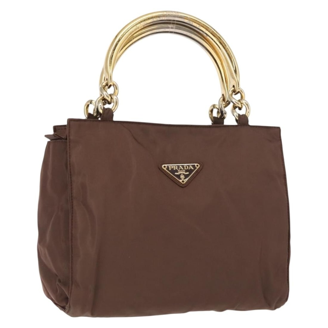 Prada brown nylon women s handbag Italy gold tone: Prada brown nylon women s handbag Italy gold tone This PRADA handbag is crafted from brown and gold nylon and features a compact, structured silhouette. Designed for women, it is made in Italy and off