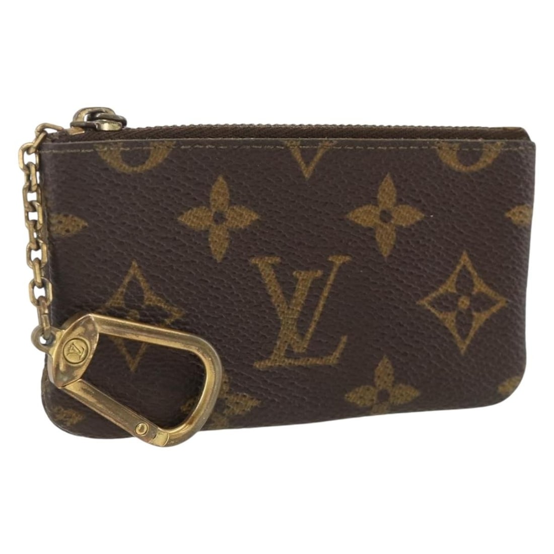 Monogram Canvas Coin Purse Louis Vuitton Pochette Cles M62650 France: Monogram Canvas Coin Purse Louis Vuitton Pochette Cles M62650 France This Louis Vuitton Monogram Pochette Cles coin purse features the iconic Monogram Canvas exterior and is designed for women. The co