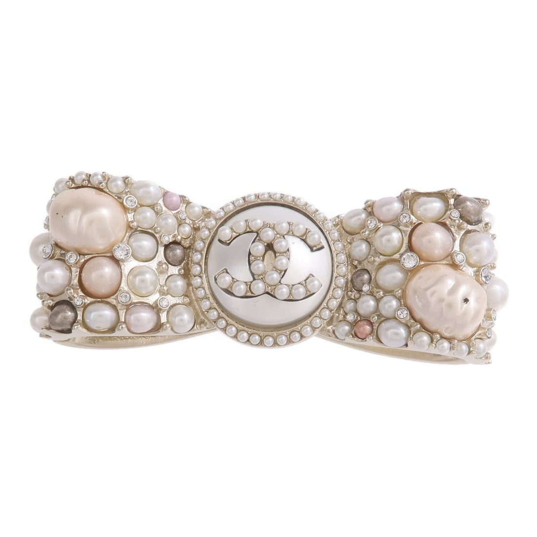 Chanel CC Gold Tone Brooch: Chanel CC Gold Tone Brooch This CHANEL brooch features the iconic CC logo, crafted from a combination of PVC and metal in gold, silver, pink, and white tones. Designed for women, it offers a stylish a