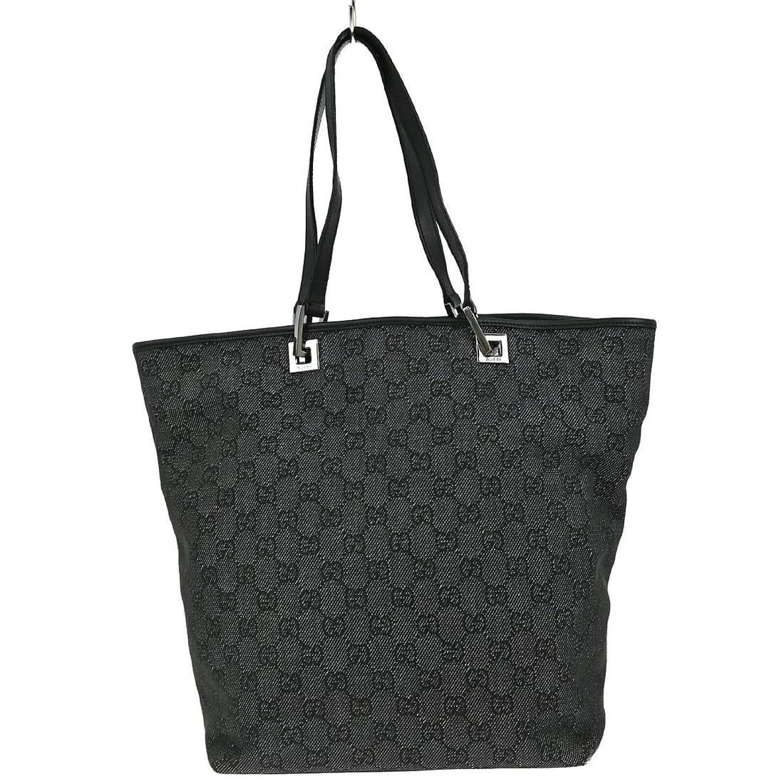 Gucci GG Black Canvas Leather Tote Bag 11 x 9 x 4 in: Gucci GG Black Canvas Leather Tote Bag 11 x 9 x 4 in This Gucci GG tote handbag features a black canvas and leather exterior with the iconic GG pattern. Designed in a large size, it offers ample space