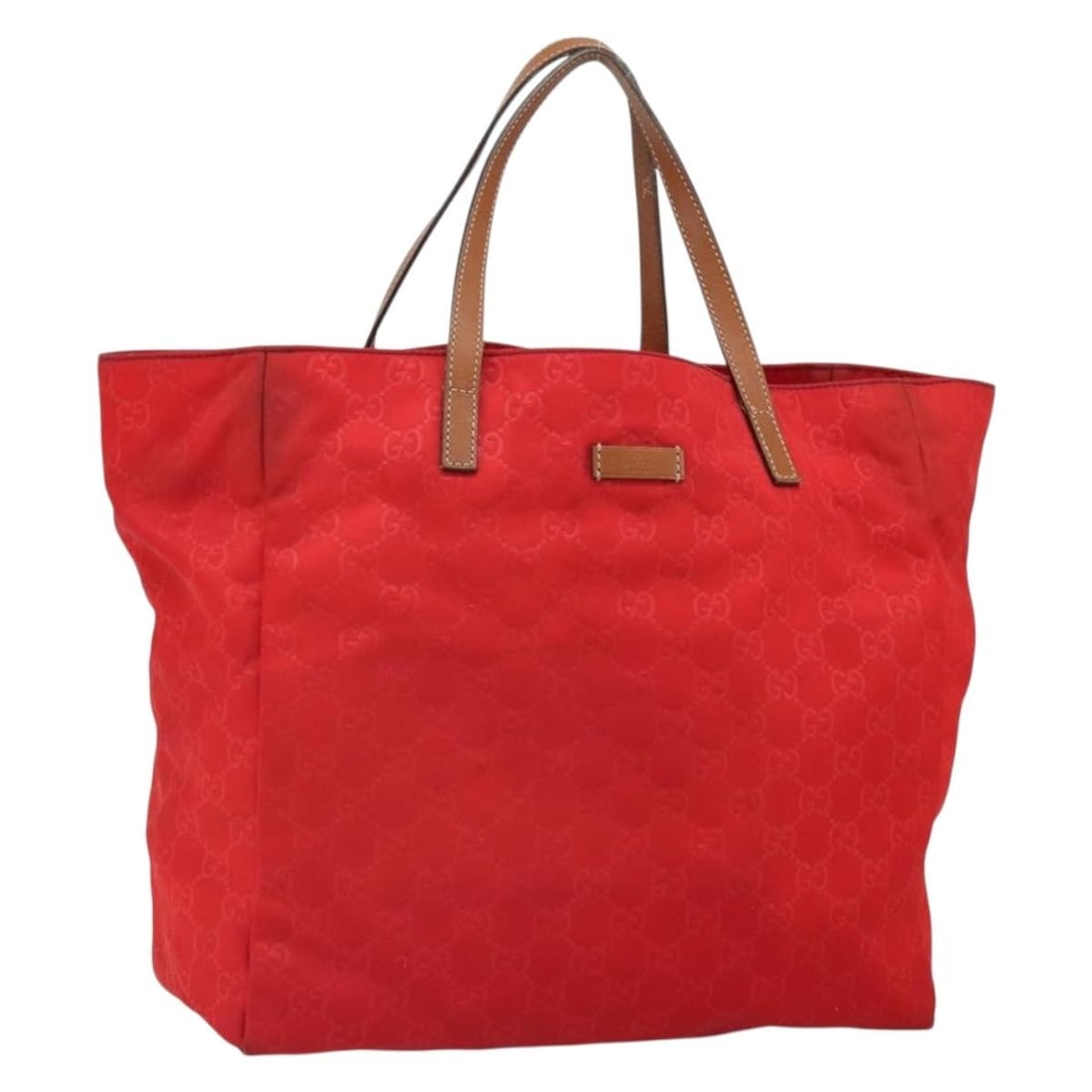 Red Nylon GG Canvas Tote 282439 by Gucci: Red Nylon GG Canvas Tote 282439 by Gucci This is a Gucci GG nylon tote bag in red, featuring GG canvas accents. The bag is made in Italy and offers a spacious main compartment, making it suitable for 