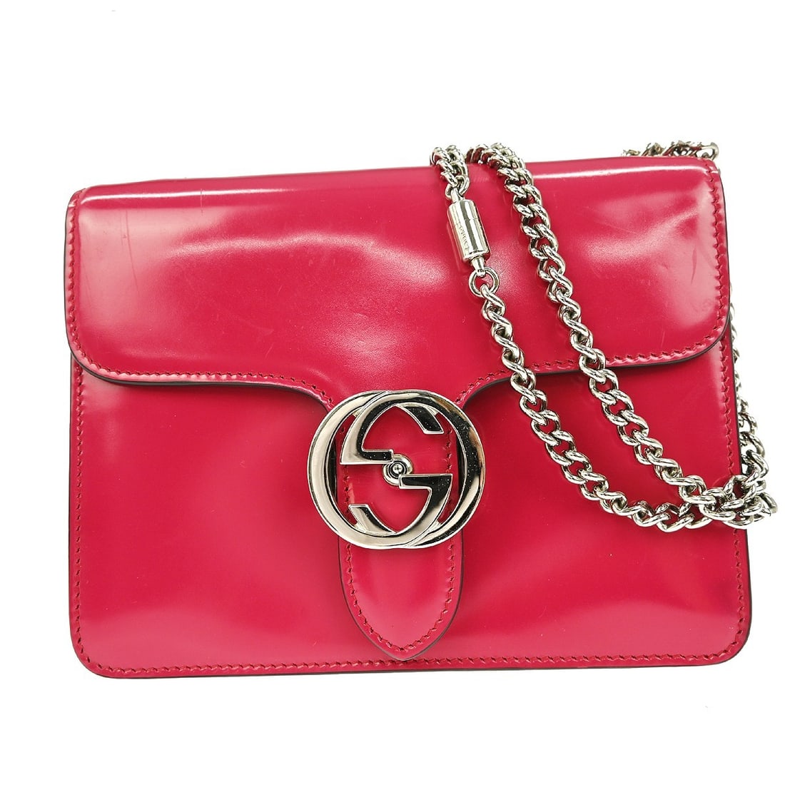 Gucci Interlocking G Pink Leather Shoulder Bag: Gucci Interlocking G Pink Leather Shoulder Bag This vintage Gucci Interlocking G shoulder bag features a pink leather exterior and a medium-sized silhouette. The bag is designed for women and showcase