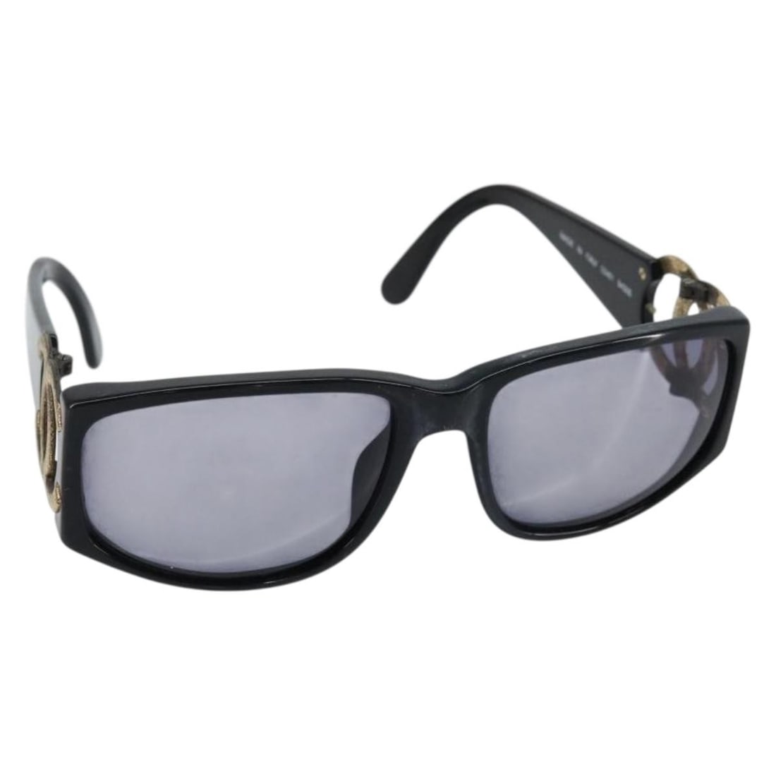 CHANEL Black Plastic Sunglasses with CC Logo Authentic: CHANEL Black Plastic Sunglasses with CC Logo Authentic Elevate your accessory game with these authentic CHANEL sunglasses, crafted in Italy. These stylish sunglasses feature a sleek black plastic fram