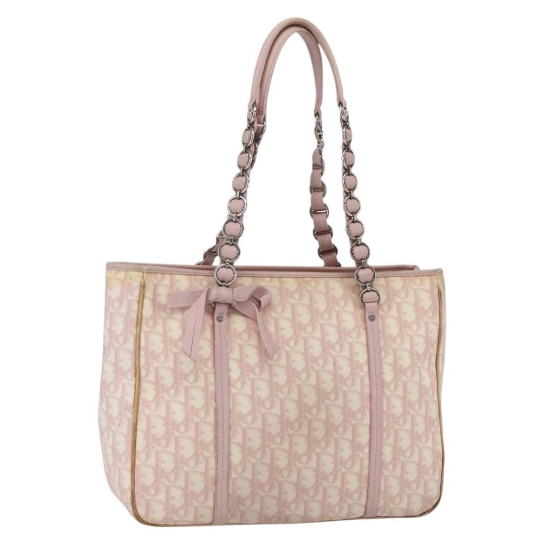Pink PVC Trotter Canvas Romantic Handbag by Christian Dior Silver Accents: Pink PVC Trotter Canvas Romantic Handbag by Christian Dior Silver Accents This is a Christian Dior Trotter Canvas Romantic hand bag crafted from pink and silver PVC leather and canvas. Made in Italy, 