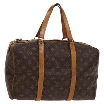 Louis Vuitton Sac Souple 35 Monogram Canvas Boston Bag M41626: Louis Vuitton Sac Souple 35 Monogram Canvas Boston Bag M41626 This Louis Vuitton Monogram Sac Souple 35 Boston Bag is crafted from the iconic Monogram Canvas and features a classic Boston bag silhouet