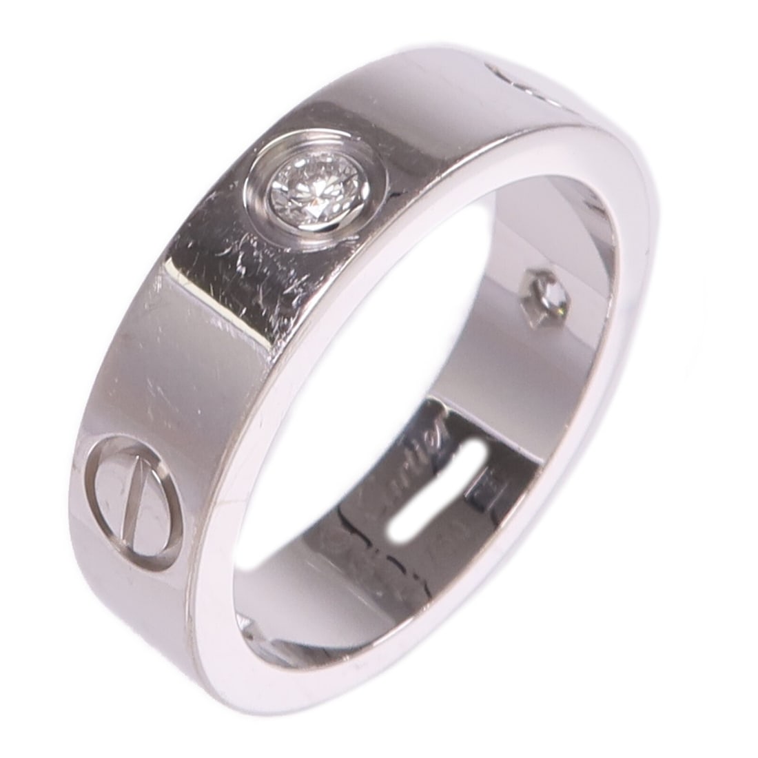 Cartier Love 18K White Gold Ring with Three Diamonds Size 7.75: Cartier Love 18K White Gold Ring with Three Diamonds Size 7.75 This un-used Cartier Love ring is crafted in 18K white gold and features three clear diamonds. Designed for both men and women, the ring 