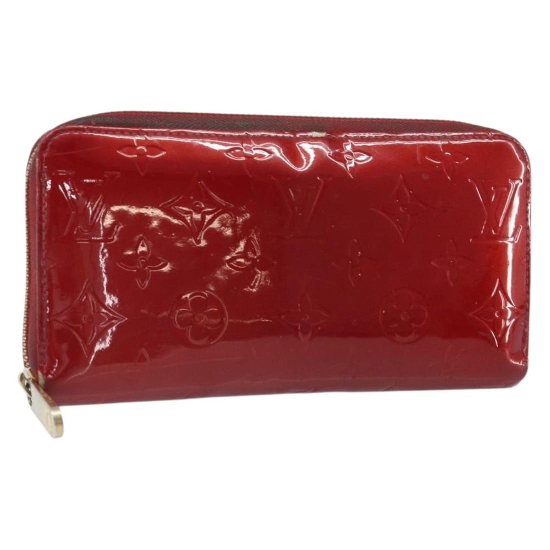 Louis Vuitton Vernis Patent Leather Long Wallet Pomme D'amour M91981: Louis Vuitton Vernis Patent Leather Long Wallet Pomme D'amour M91981 This Louis Vuitton Vernis Zippy long wallet in Pomme D'amour features patent leather construction with a glossy finish. The wallet 