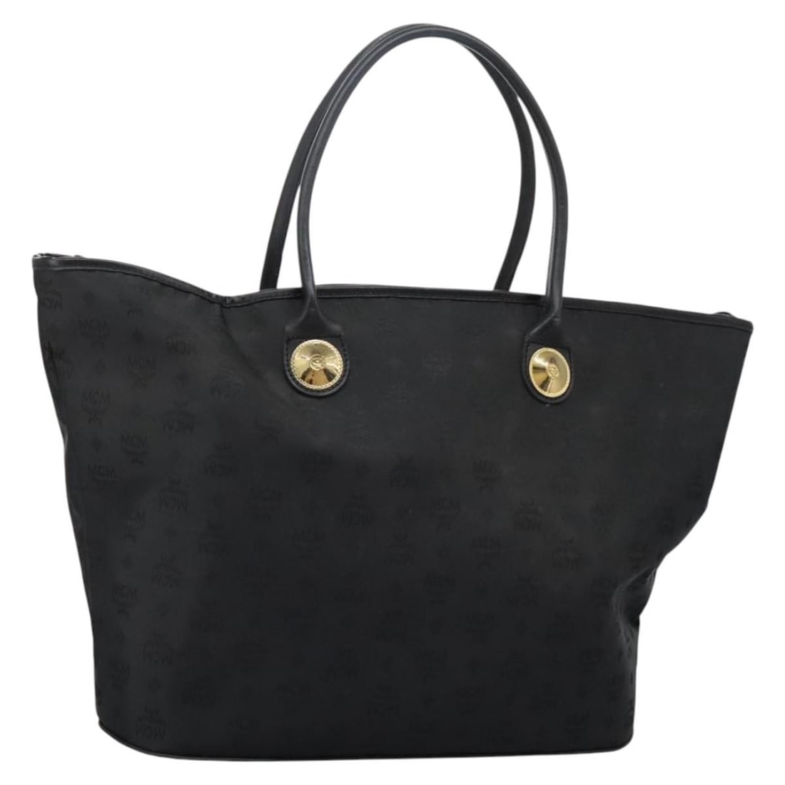 MCM Black Nylon Tote Bag for Women Made in Germany: MCM Black Nylon Tote Bag for Women Made in Germany This MCM tote bag is crafted from durable black nylon and designed for women. Made in Germany, it features a spacious main compartment and sturdy han