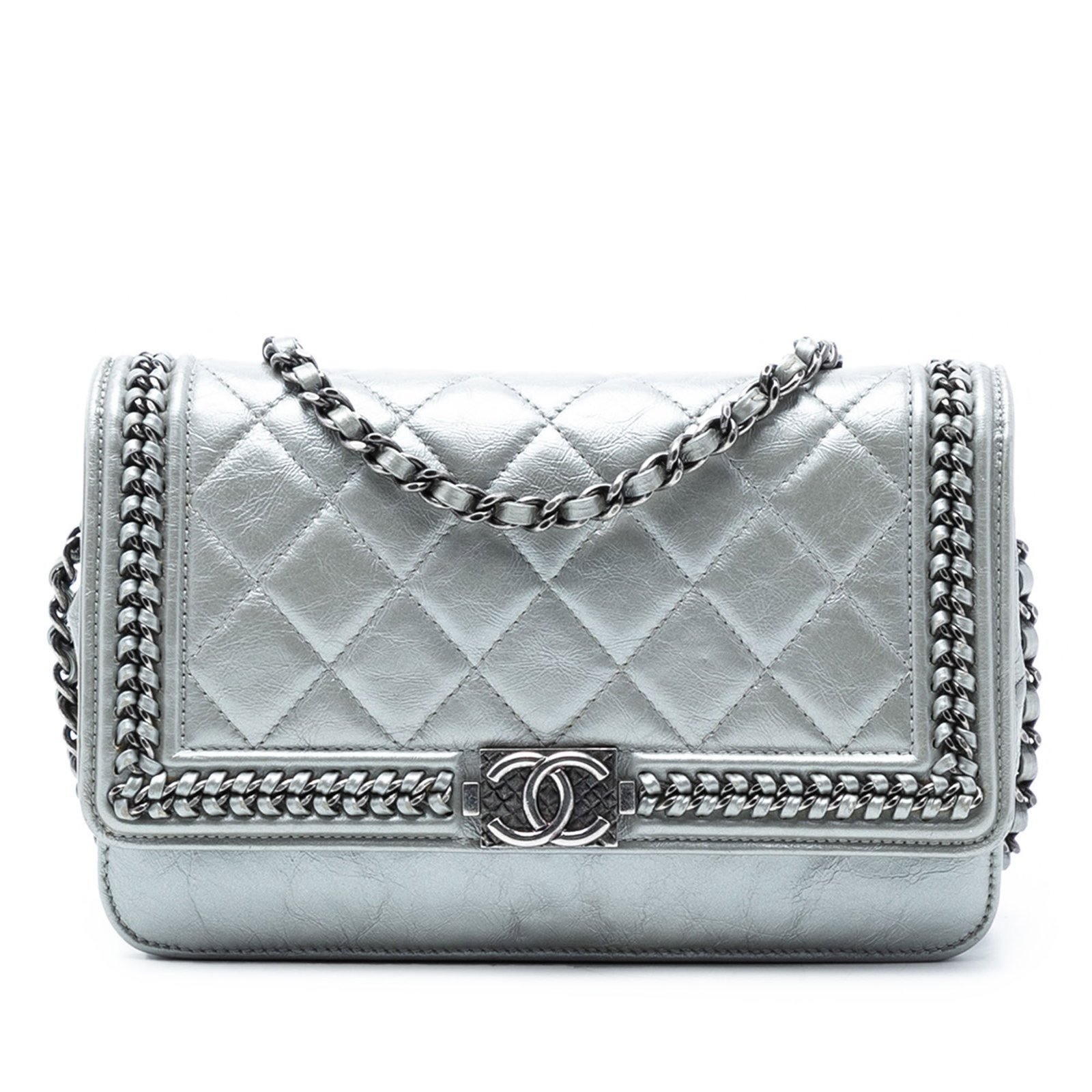 Boy Wallet On Chain Silver Quilted Metallic Leather by Chanel: Boy Wallet On Chain Silver Quilted Metallic Leather by Chanel This Chanel Boy Wallet on Chain features a quilted crinkled metallic calfskin leather body in silver, accented with a leather-woven chain 