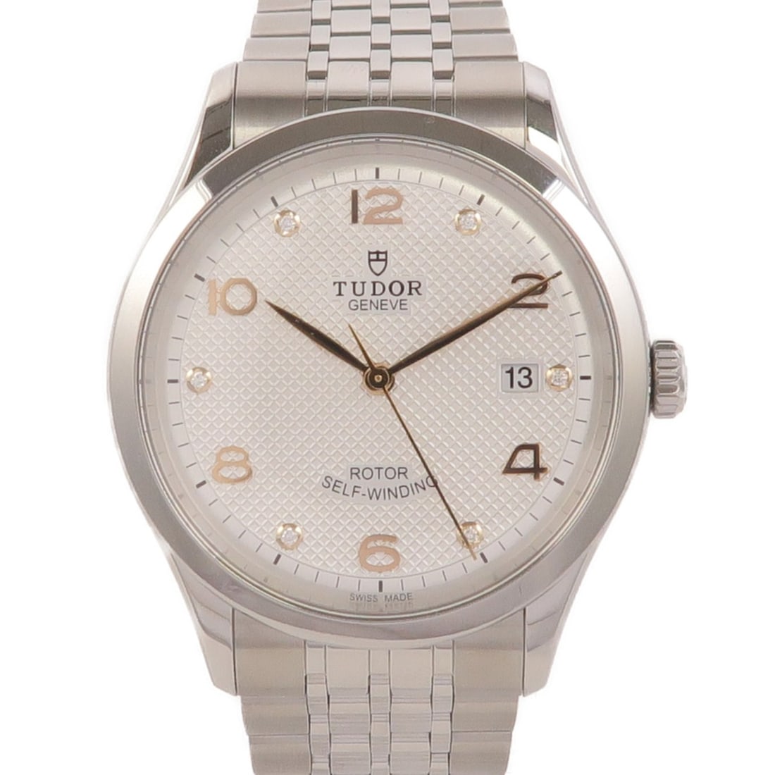 TUDOR Silver Stainless Steel Automatic Wristwatch 91550: TUDOR Silver Stainless Steel Automatic Wristwatch 91550 This Tudor 1926 automatic wristwatch features a stainless steel case and band with a silver dial and frame. Designed for men, it offers automati