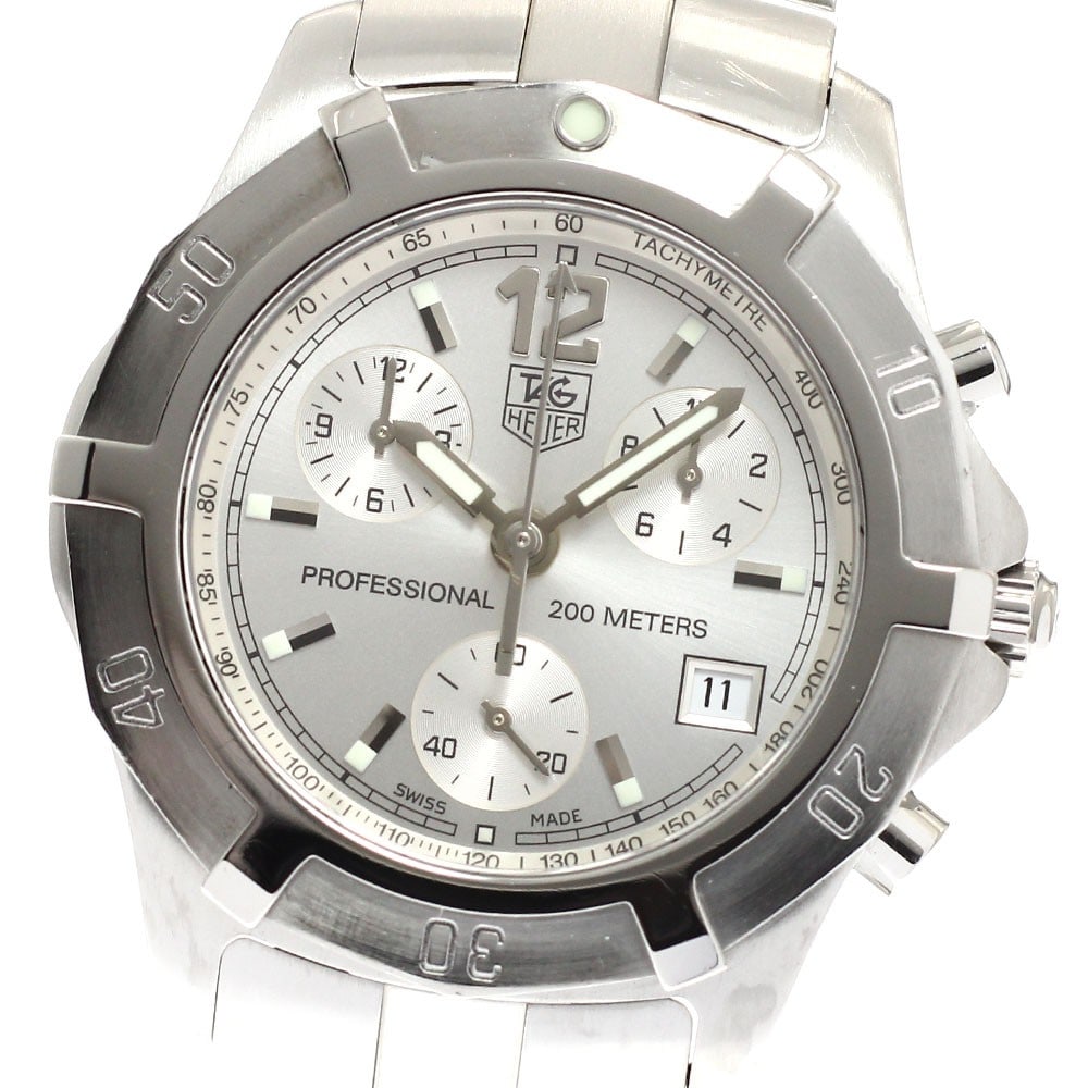 TAG Heuer Exclusive Quartz Chronograph Date Men's Wristwatch: TAG Heuer Exclusive Quartz Chronograph Date Men's Wristwatch This TAG HEUER CN1111 Exclusive is a men's chronograph wristwatch featuring a stainless steel case and bracelet with a silver dial. The wat