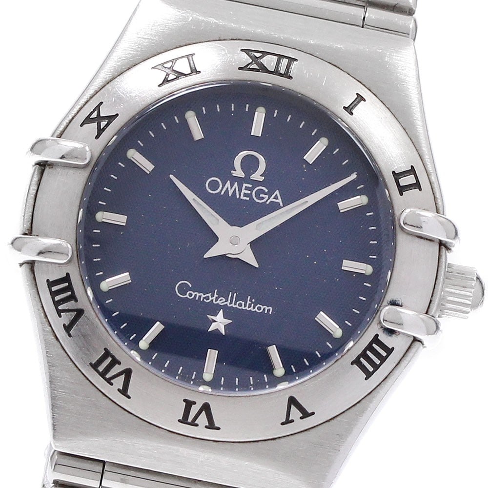Omega Constellation Mini 1562.40 gray dial quartz ladies watch: Omega Constellation Mini 1562.40 gray dial quartz ladies watch This OMEGA Constellation Mini Quartz women's wristwatch features a stainless steel case and bracelet with a gray dial. The watch is power