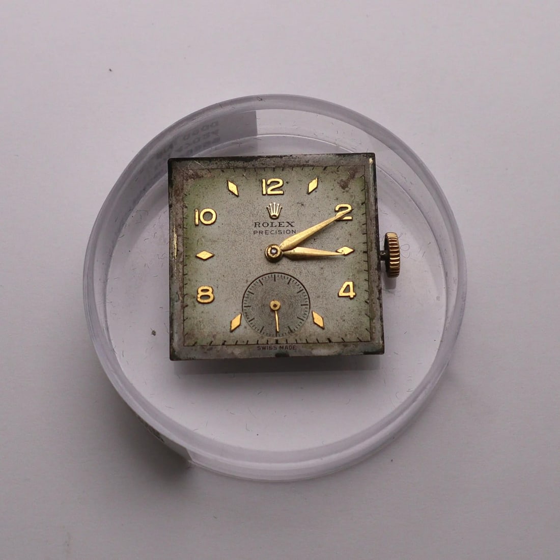 Vintage Rolex Caliber 700 Movement with 17 Jewels Dial: Vintage Rolex Caliber 700 Movement with 17 Jewels Dial This vintage Rolex Precision movement features a 17-jewel dial and caliber 700, suitable for unisex adult use. The set includes a dial and moveme