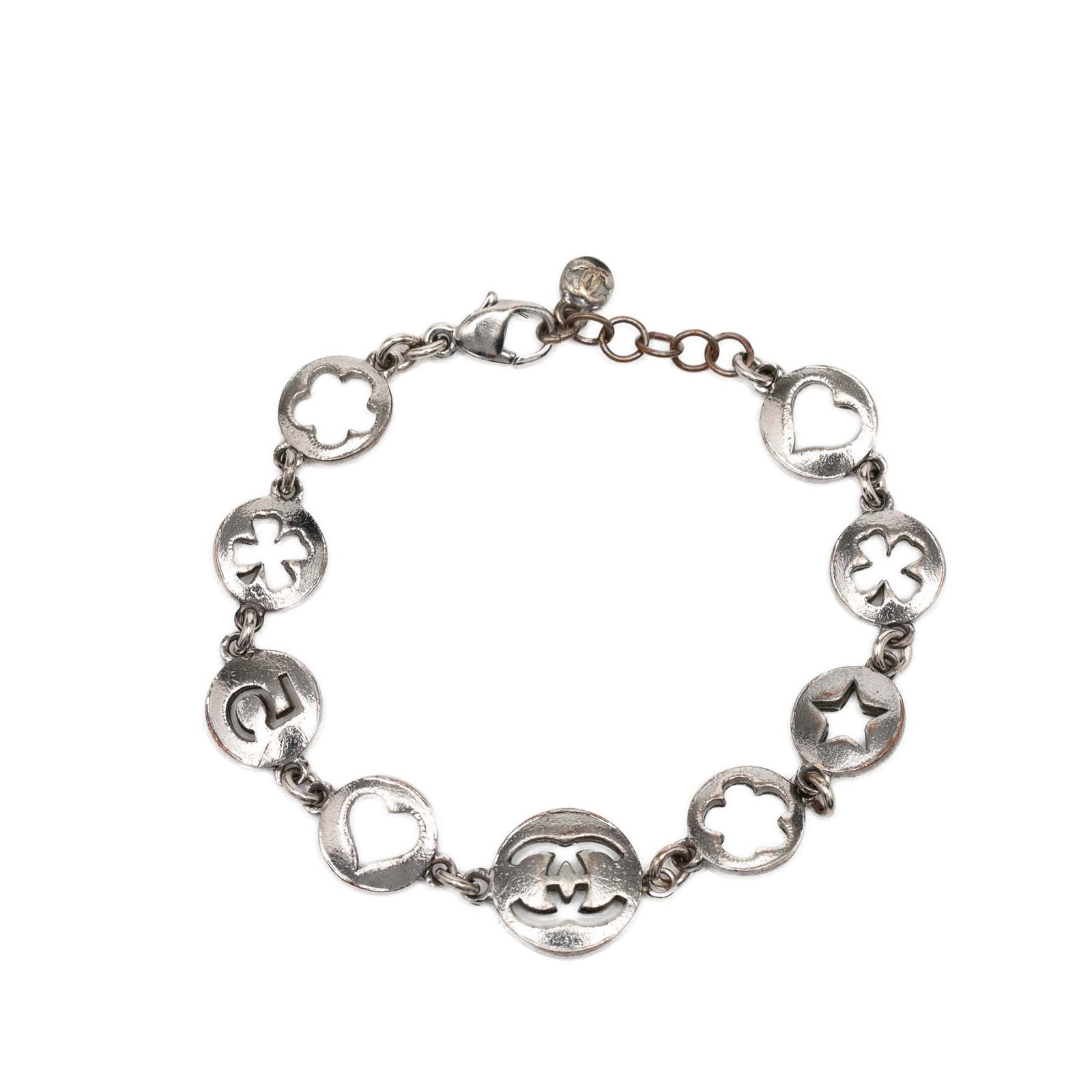 Chanel Silver Tone Metal Bracelet With CC and Number 5 Cutout Charms: Chanel Silver Tone Metal Bracelet With CC and Number 5 Cutout Charms This Chanel bracelet features a silver tone metal chain adorned with circular cutout charms, including the iconic No. 5 and CC moti