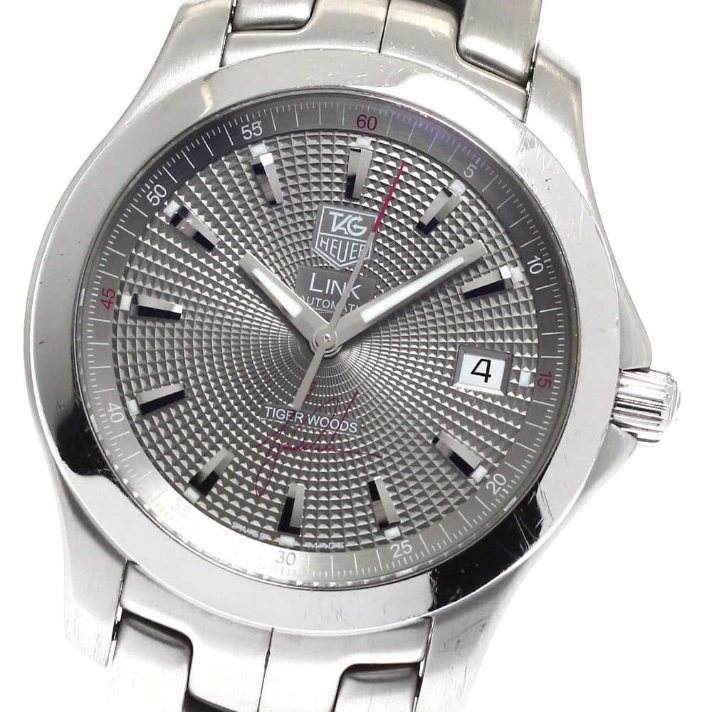 TAG Heuer Link Tiger Woods automatic date men's wristwatch WJF2113: TAG Heuer Link Tiger Woods automatic date men's wristwatch WJF2113 This TAG Heuer Link Tiger Woods Limited Edition men's wristwatch is a Swiss-made timepiece, produced in a limited run of 5,500 pieces