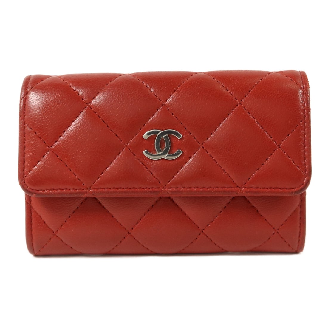 CHANEL Timeless Red Lambskin Card Case SHW: CHANEL Timeless Red Lambskin Card Case SHW This CHANEL Timeless card holder is crafted from luxurious red lambskin leather and features silver-tone hardware. Designed for women, it offers a stylish an