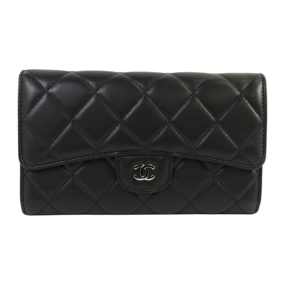 Chanel Black Lambskin Leather Bifold Wallet with Silver CC Logo: Chanel Black Lambskin Leather Bifold Wallet with Silver CC Logo This CHANEL long bifold wallet is crafted from luxurious black lambskin leather, featuring the signature CC logo and silver-tone hardwar