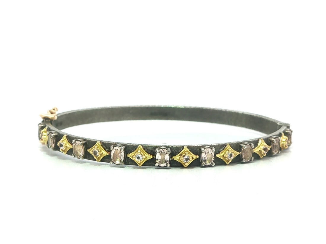 Armenta Crivelli Morganite Hinged Bangle in Blackened Sterling Silver 18k Gold: Armenta Crivelli Morganite Hinged Bangle in Blackened Sterling Silver 18k Gold This Armenta Crivelli bangle bracelet features a sophisticated combination of solid blackened sterling silver and 18k yel