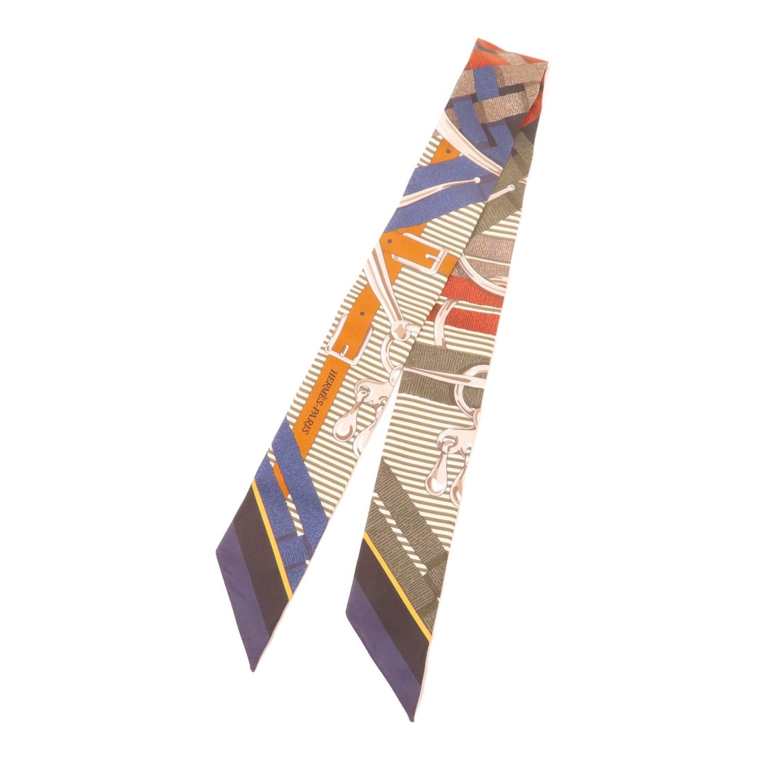 Hermes silk multicolor Twilly scarf: Hermes silk multicolor Twilly scarf This Hermes Twilly scarf is crafted from luxurious silk and features a vibrant multicolor design. Made in France, it is designed for women and offers a pristine, un