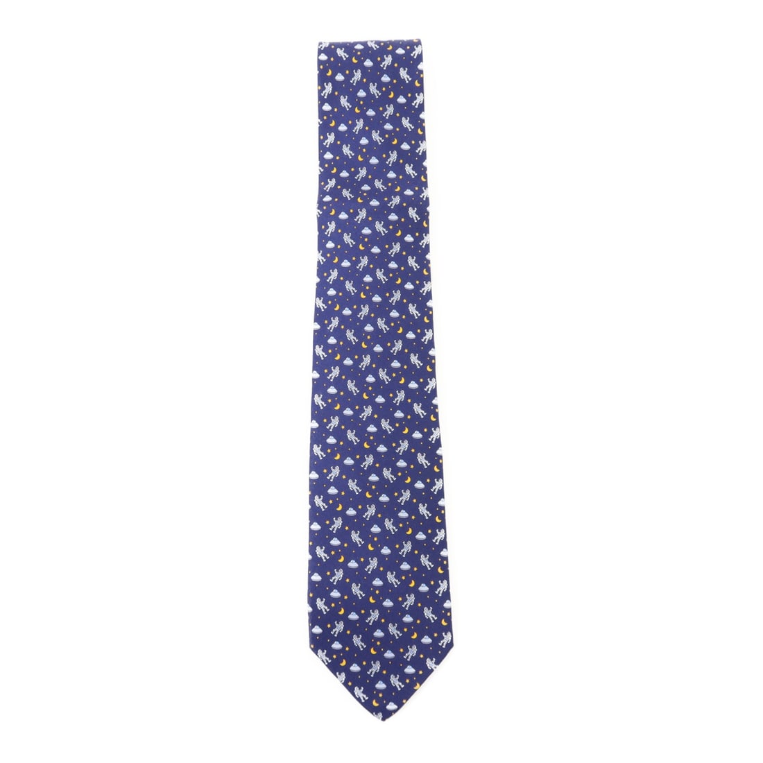 Silk Tie in Navy by Salvatore Ferragamo: Silk Tie in Navy by Salvatore Ferragamo This Salvatore Ferragamo necktie features a classic design crafted from silk in navy and gray tones. Made in Italy, it showcases exceptional quality and a prist