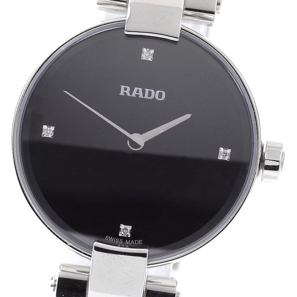 Rado Coupole Quartz Womens Stainless Steel Watch R22854703: Rado Coupole Quartz Womens Stainless Steel Watch R22854703 This pre-owned RADO Coupole women's wristwatch features a stainless steel case and band, with a black dial and quartz movement. The watch sho