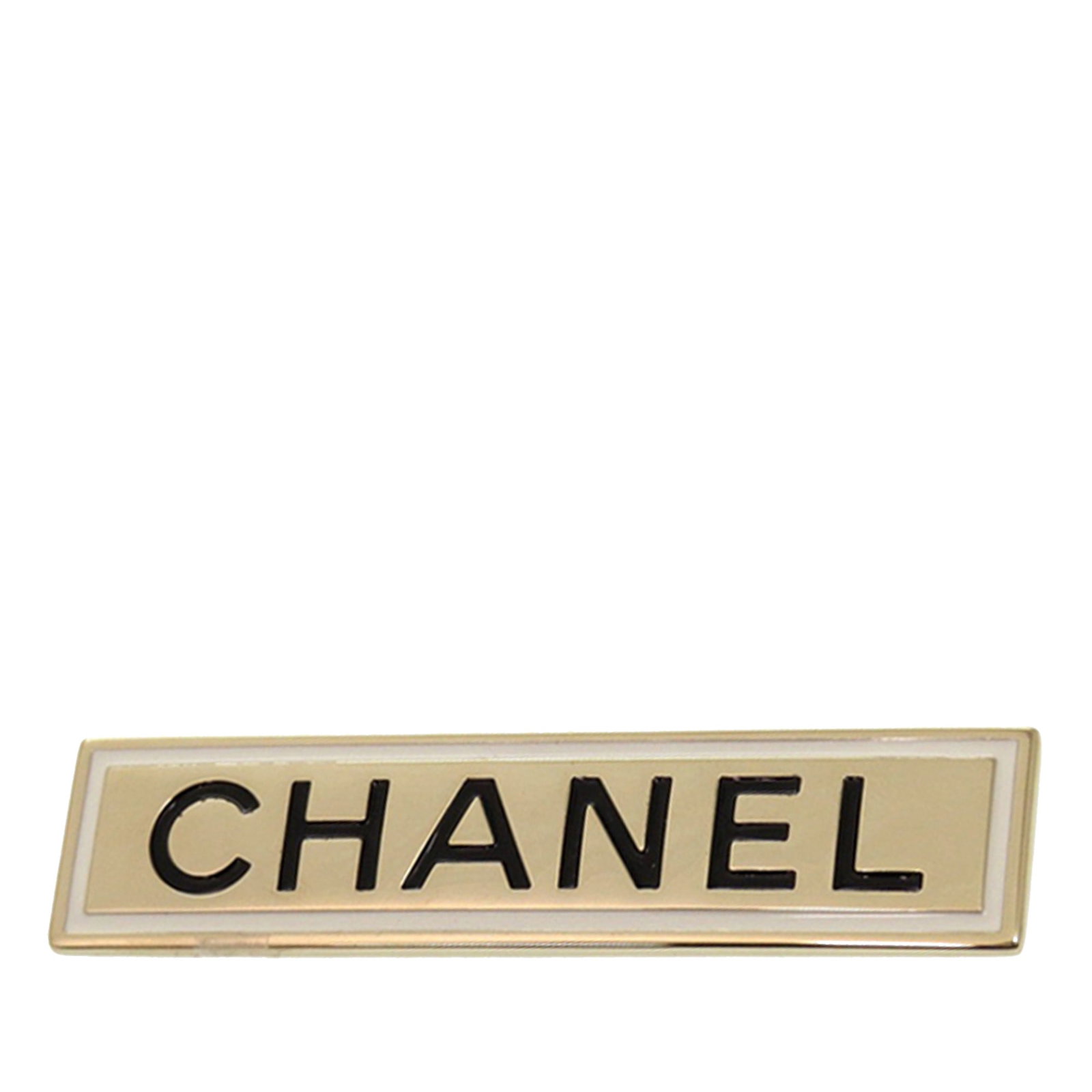 Chanel Metal Brooch with Gold Tone Logo Plaque: Chanel Metal Brooch with Gold Tone Logo Plaque This Chanel brooch features a gold-tone metal body with a logo plate design and a back pin closure. Made in Italy, it is categorized as a costume accesso