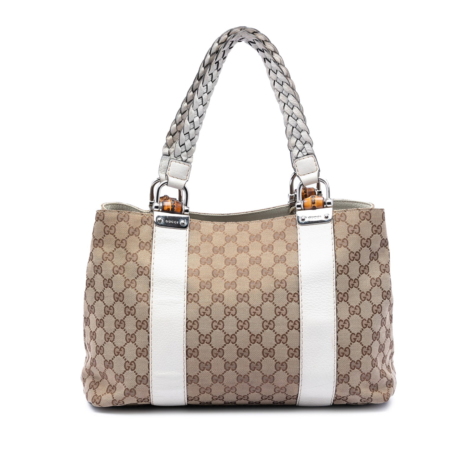 Gucci Bamboo Libeccio Tote Medium GG Canvas with Leather Trim: Gucci Bamboo Libeccio Tote Medium GG Canvas with Leather Trim This Gucci Medium GG Canvas Bamboo Libeccio Tote features a canvas body with leather trim, flat braided straps, and an open top. The inter