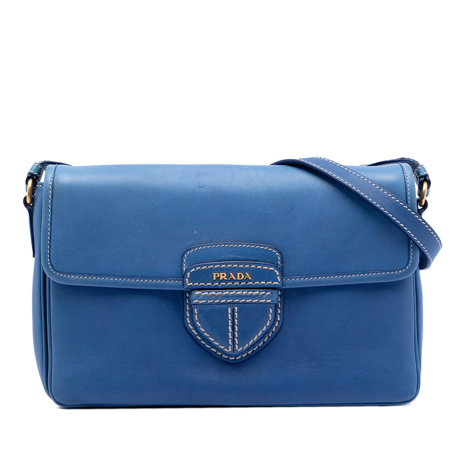 Prada Blue Leather City Calf Push Lock Flap Crossbody Bag: Prada Blue Leather City Calf Push Lock Flap Crossbody Bag This Prada City Calf Push Lock Flap Crossbody features a blue leather body with a detachable and adjustable flat leather strap. It offers a to