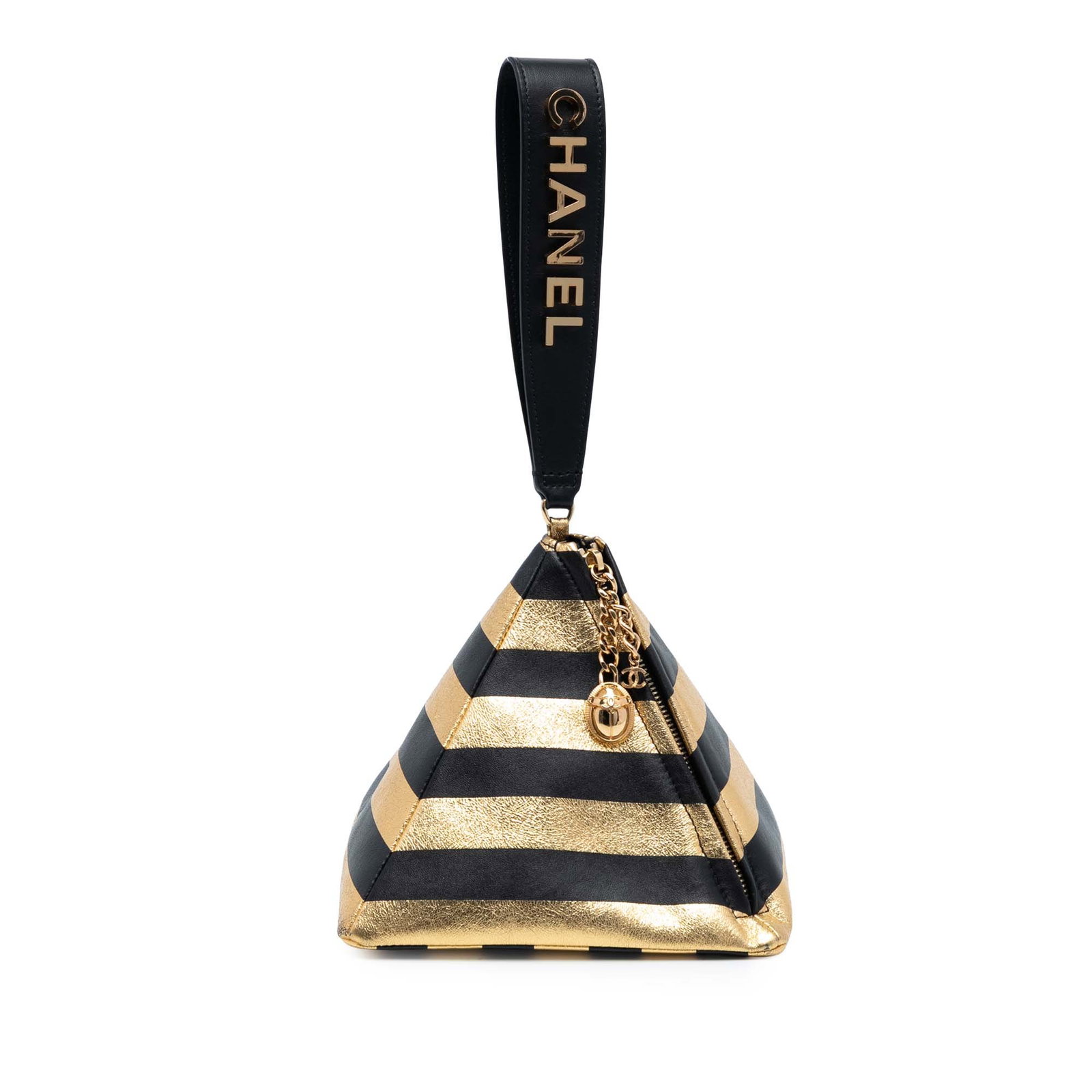 Kheops Pyramid Shaped Gold Leather Clutch by Chanel: Kheops Pyramid Shaped Gold Leather Clutch by Chanel This Chanel Metallic Lambskin Kheops Pyramid Clutch features a striped leather exterior in a gold tone, a flat handle, and a side zip closure. The b