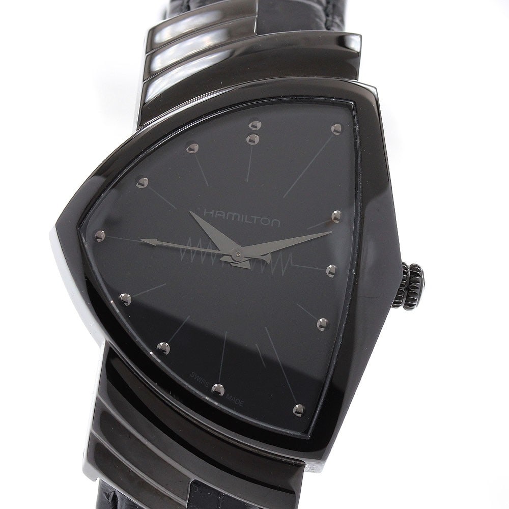 Hamilton Ventura Full Black Quartz Men's Wristwatch H244010: Hamilton Ventura Full Black Quartz Men's Wristwatch H244010 This pre-owned Hamilton Ventura Full Black Quartz men's wristwatch features a stainless steel case and a black leather bracelet. The watch i