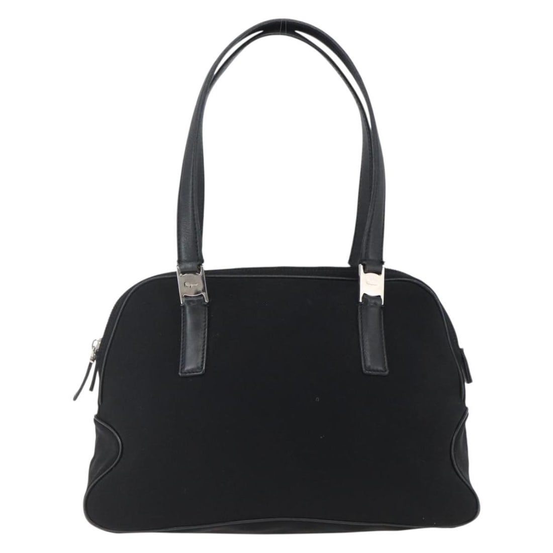 Salvatore Ferragamo Black Nylon Vintage Ladies Handbag 30x19x9cm: Salvatore Ferragamo Black Nylon Vintage Ladies Handbag 30x19x9cm This vintage Salvatore Ferragamo handbag for women is crafted from black nylon with leather accents. It features metal fittings and a s
