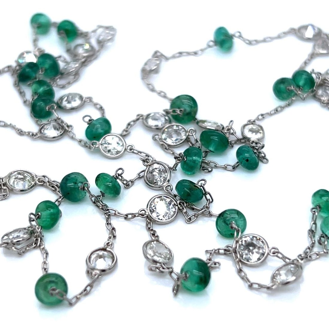 46 Inch Platinum Necklace With Diamonds And Emeralds 31 Stone Station Design: 46 Inch Platinum Necklace With Diamonds And Emeralds 31 Stone Station Design This platinum station necklace features 31 diamonds with an approximate total weight of 10.00 carats, showcasing F-I color 