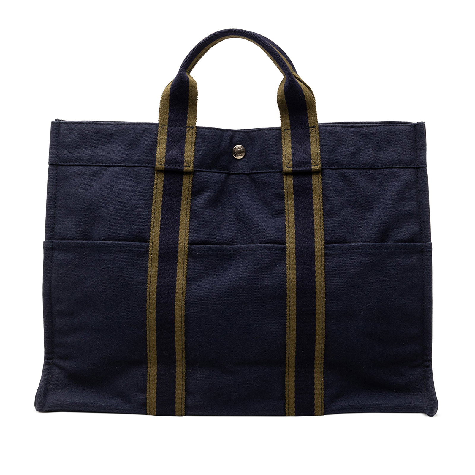 Hermes Fourre Tout MM Blue Canvas Tote Bag with Snap Closure: Hermes Fourre Tout MM Blue Canvas Tote Bag with Snap Closure The Hermes Canvas Fourre Tout MM tote features a durable canvas body with flat handles, an open top secured by a snap closure, exterior sli