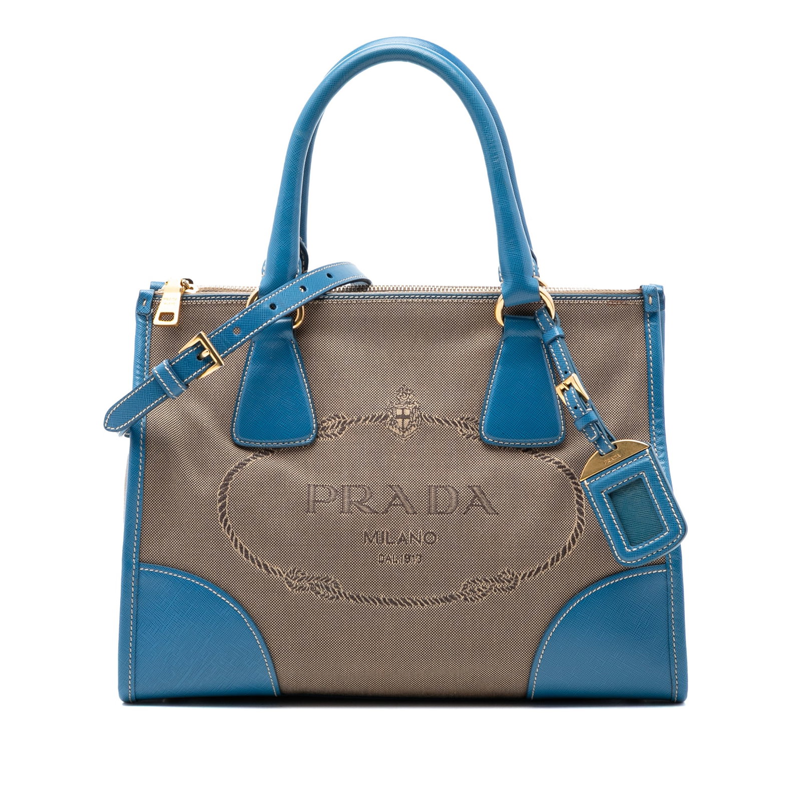 Prada Canapa Canvas Satchel with Saffiano Leather Trim and Double Zip: Prada Canapa Canvas Satchel with Saffiano Leather Trim and Double Zip This Prada Saffiano Trimmed Canvas Canapa Logo Double Zip Satchel features a durable canvas body with saffiano leather trim, rolle