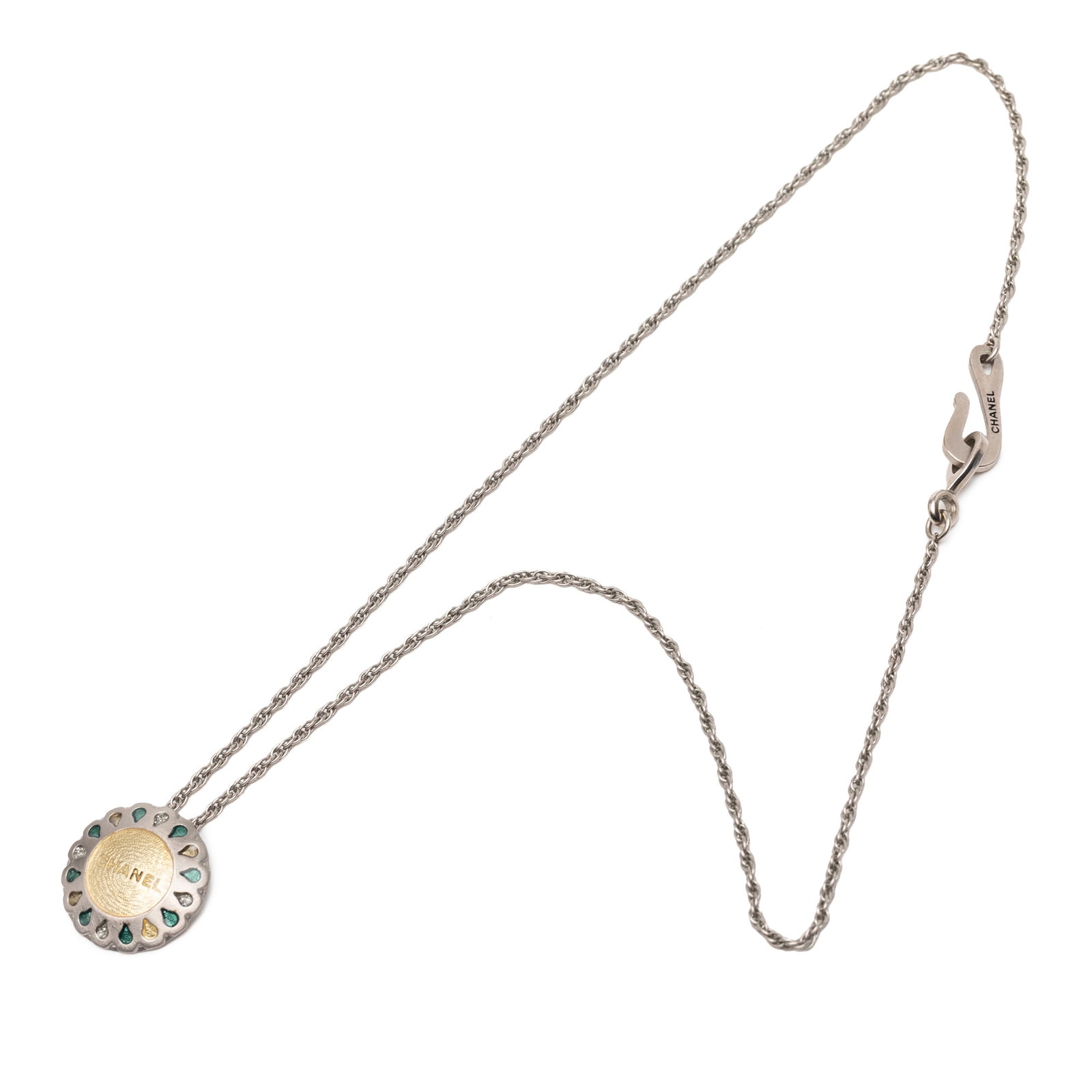 Chanel Flower Pendant Necklace with Silver Plated Rhinestones: Chanel Flower Pendant Necklace with Silver Plated Rhinestones This Chanel necklace features a silver-tone chain and a flower-shaped pendant adorned with rhinestones. The necklace is crafted from metal