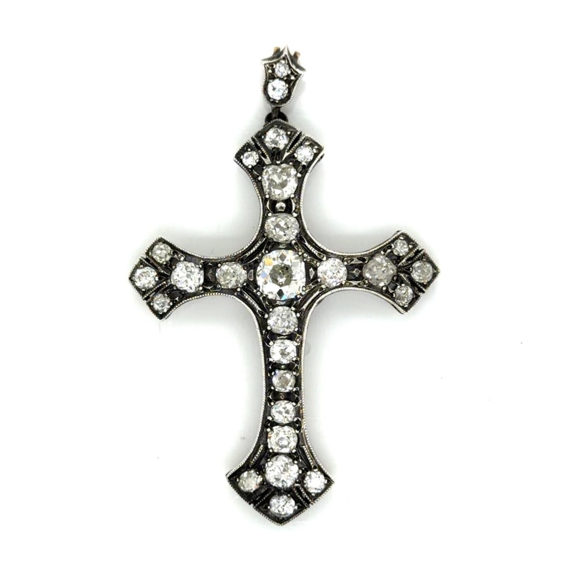 Diamond Cross Pendant in 18K Gold and Silver with Old Mine Stones: Diamond Cross Pendant in 18K Gold and Silver with Old Mine Stones This pendant features a cross design crafted with a silver top and 18K gold. It is centered with an approximately 1.575 carat diamond 